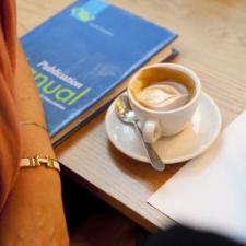 APA Publishing Manual and coffee